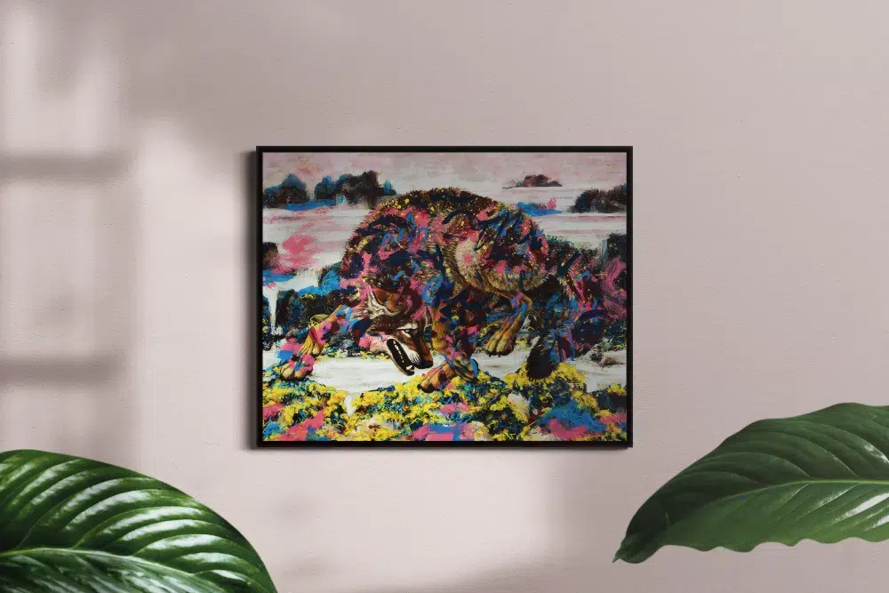 Coastal Wolf At Play-framed mockup in room. A painting of a wolf playfully leaping over some seaweed covered rocks. The rocky coastline background is rendered loosly in an abstract style. The wolf is painted over with abstract elements in various colors.