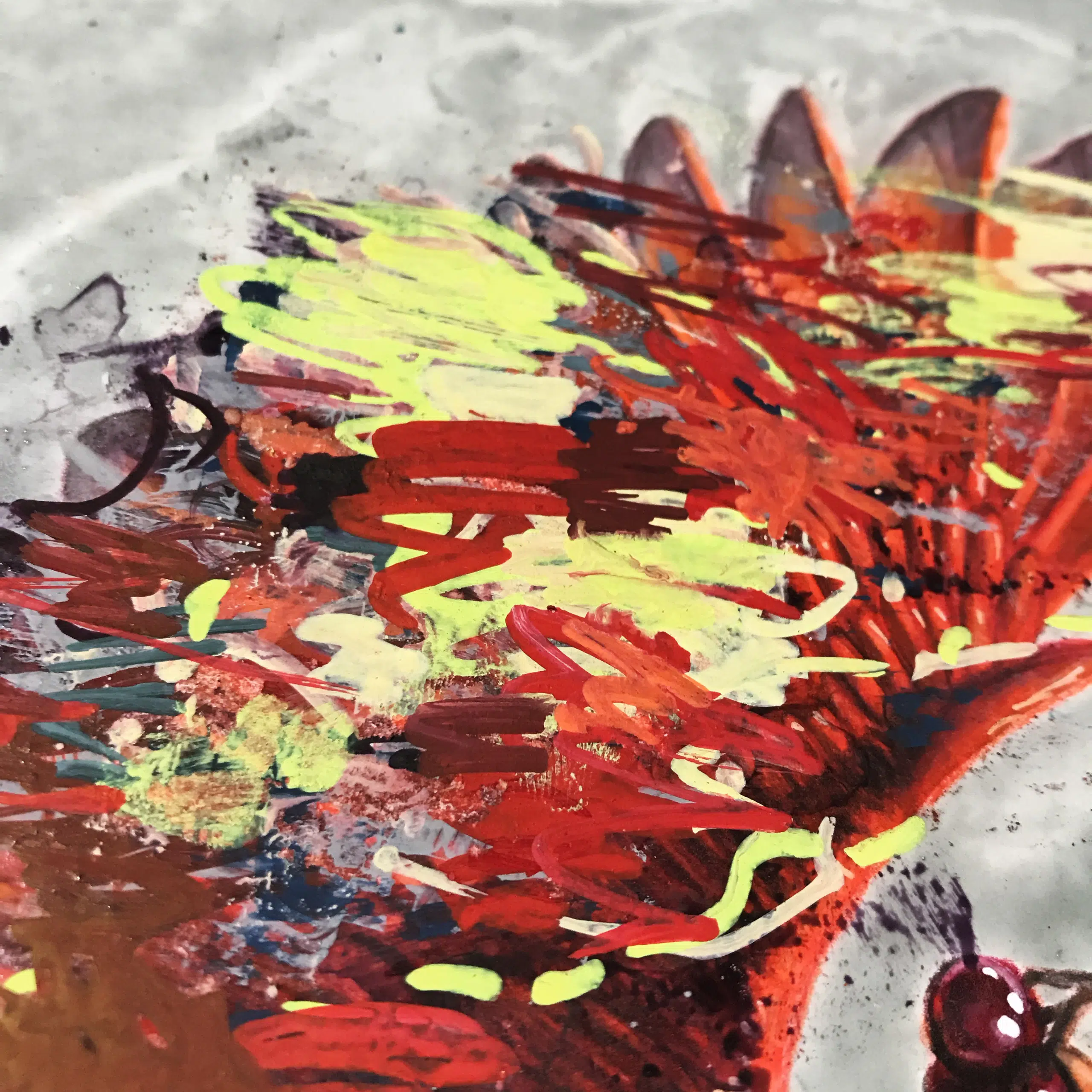 Winter Cardinal-cropped detail of in progress wing. A drawing of a red cardinal in flight, holding a cluster of berries in its mouth. The drawing is colored over with abstract elements of paint in various colors.